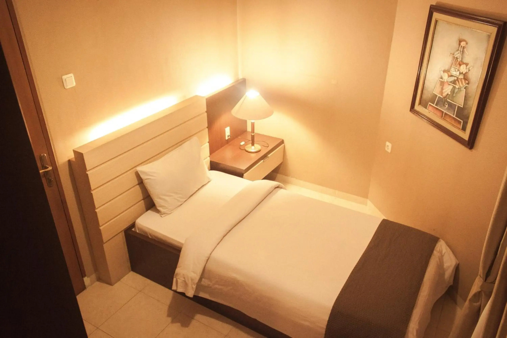 Foto - Travellers Suites Serviced Apartments