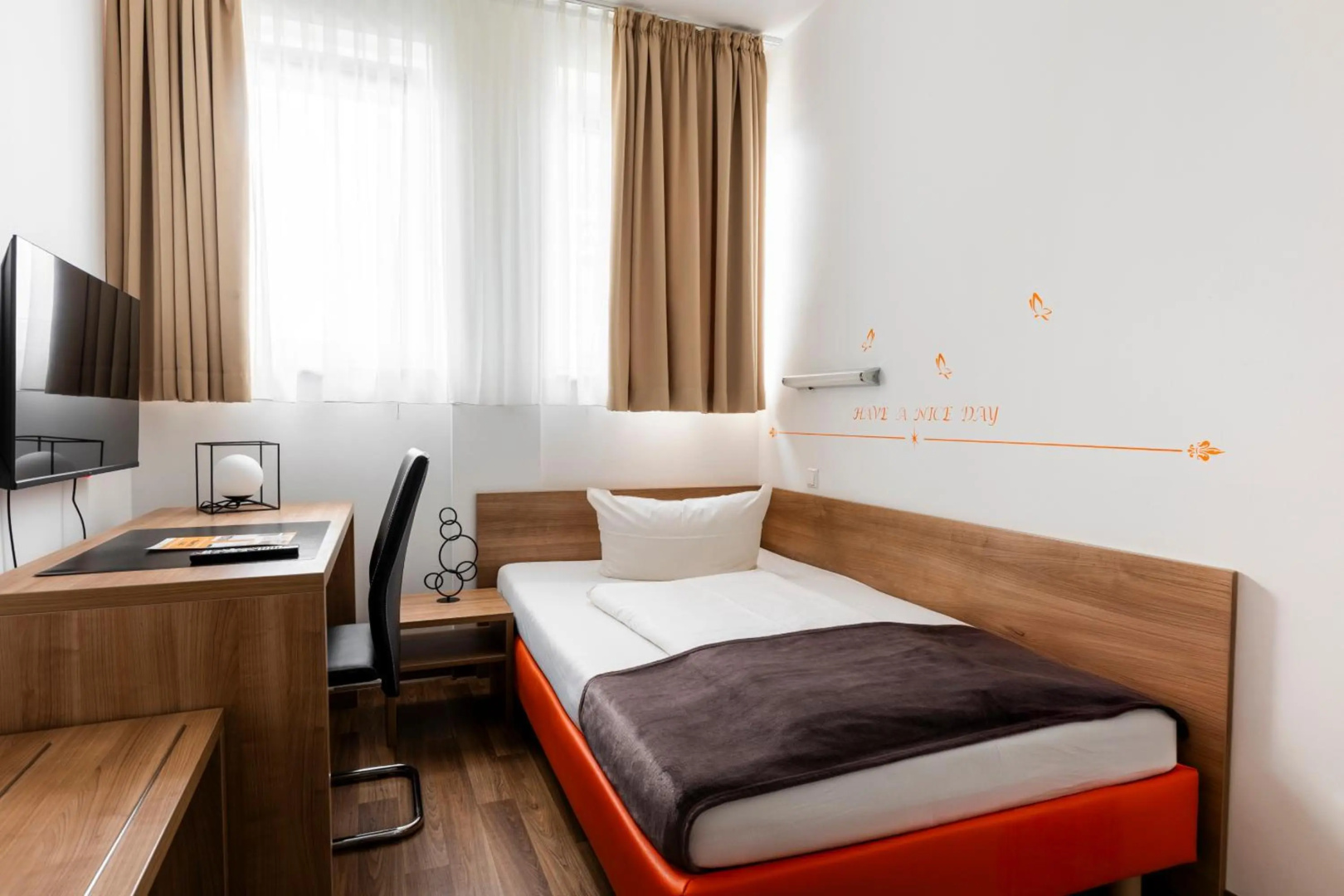 Foto - Orange Hotel und Apartments