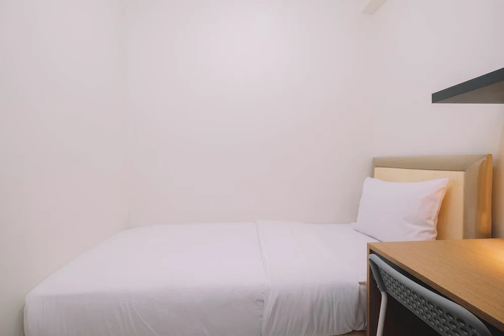 Simple and Cozy Living 2BR at Podomoro Golf View Apartment