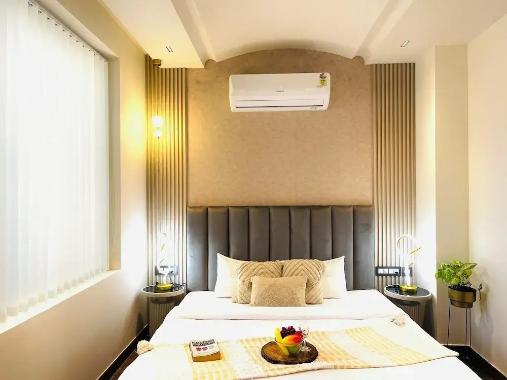 Foto - Bedchambers Stay near Select Citywalk, Saket