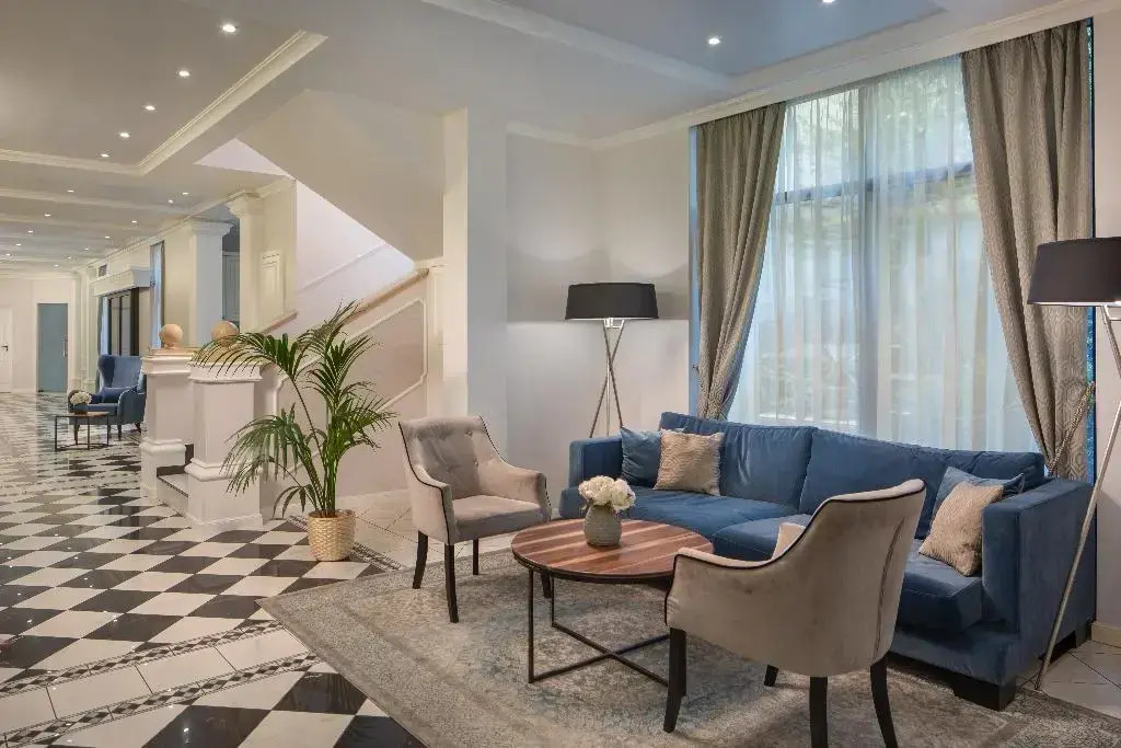 Foto - Queen's Court Hotel & Residence