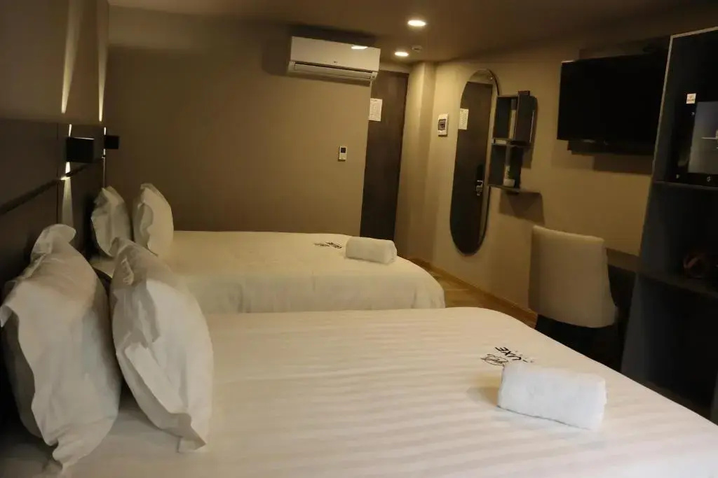 Foto - Giluxe Hotel