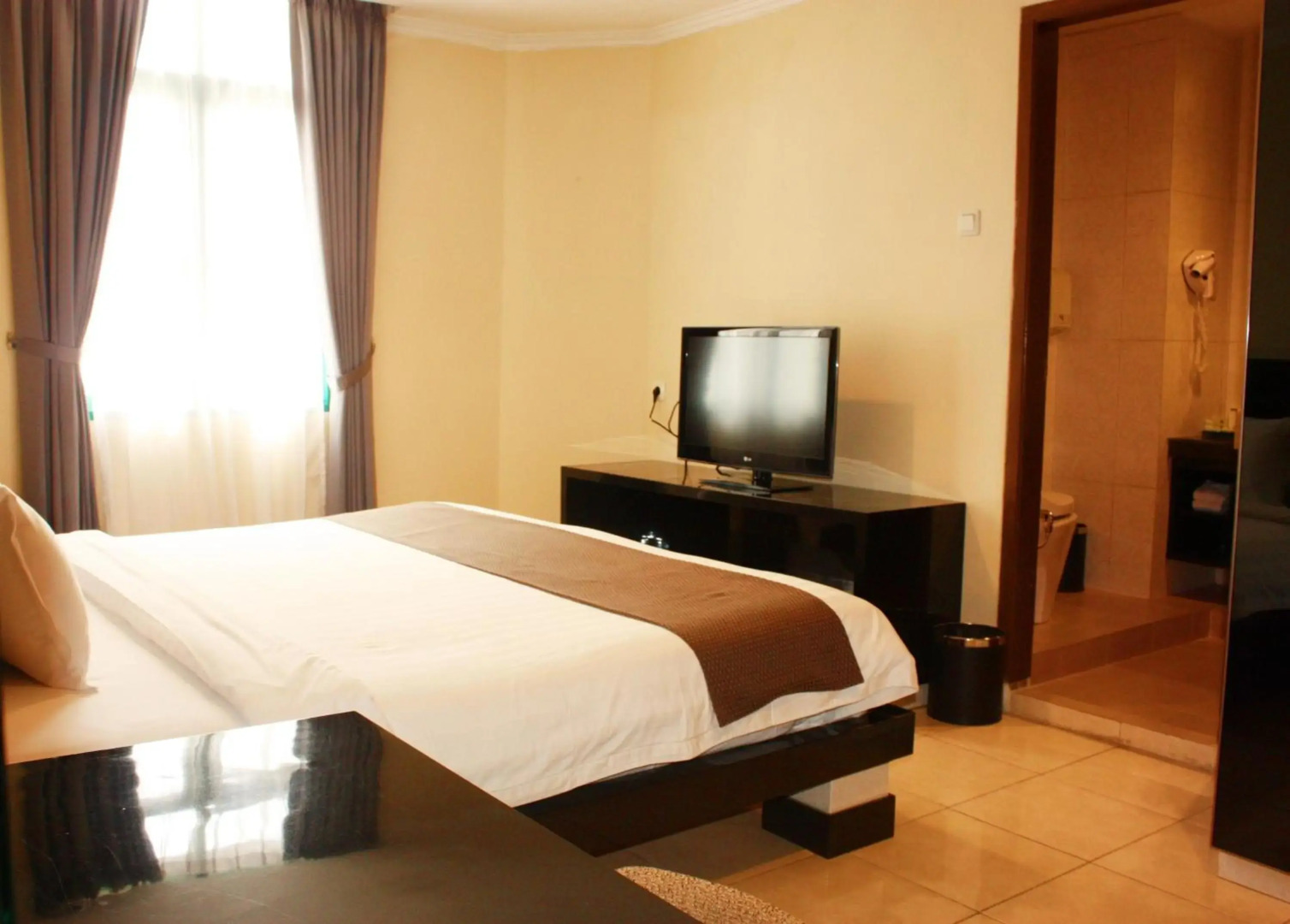 Foto - Travellers Suites Serviced Apartments