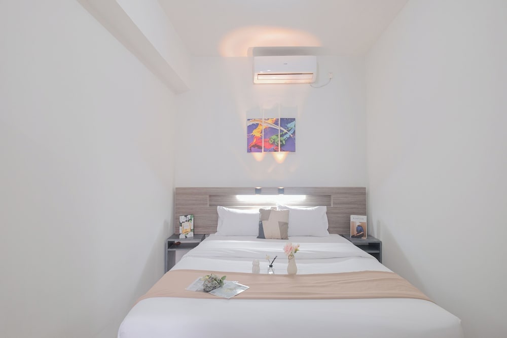 Warm and Spacious 2BR Apartment at Vittoria Residence