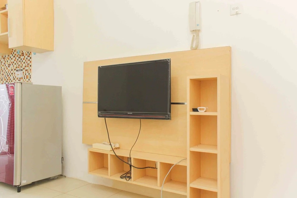 Simple and Cozy Living Studio Room at Bassura City Apartment