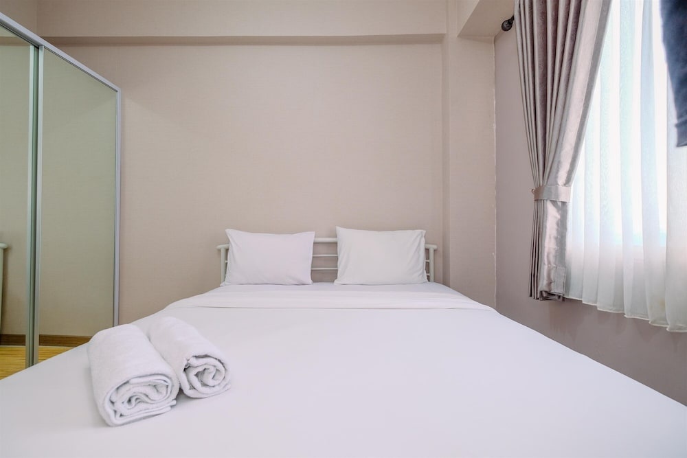 Homey and Cozy Living 2BR Podomoro Golf View Apartment