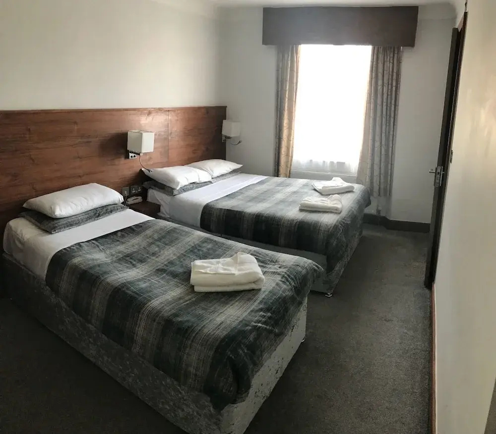 Foto - Leisure Inn