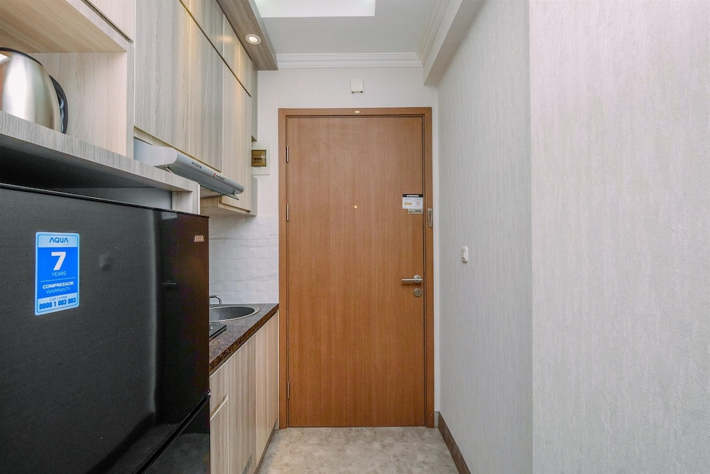 Homey Studio Room at Podomoro Golf View Apartment