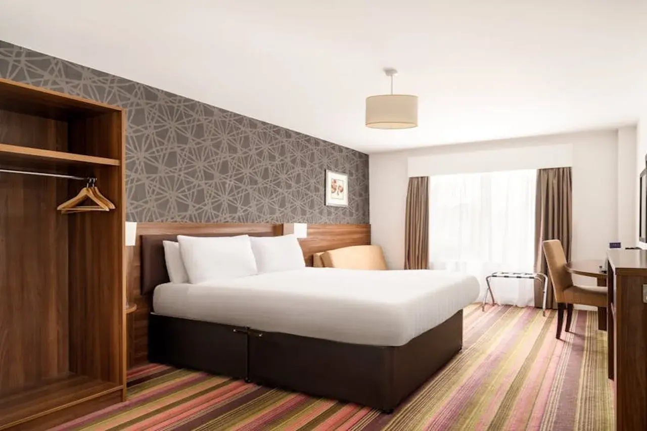Foto - Rooms Inn