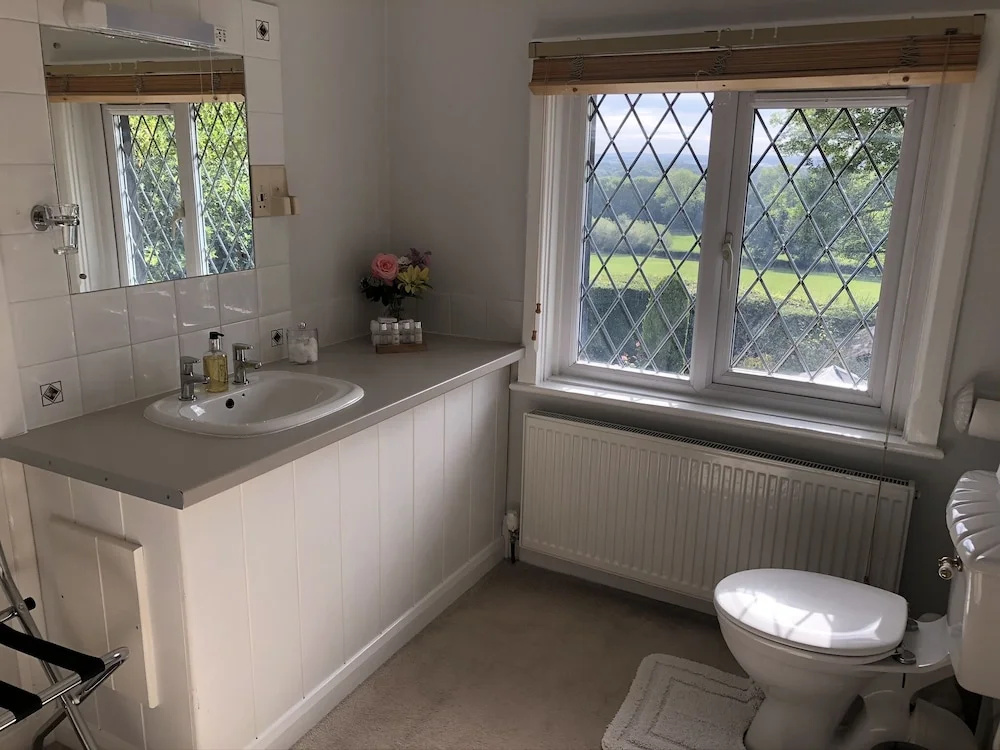 Photo - Trumbles Gatwick B&B, Peaceful Stay with Parking & Easy Airport Access