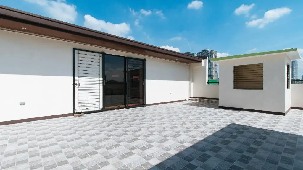 Foto - RedDoorz Plus near Uptown BGC Mall