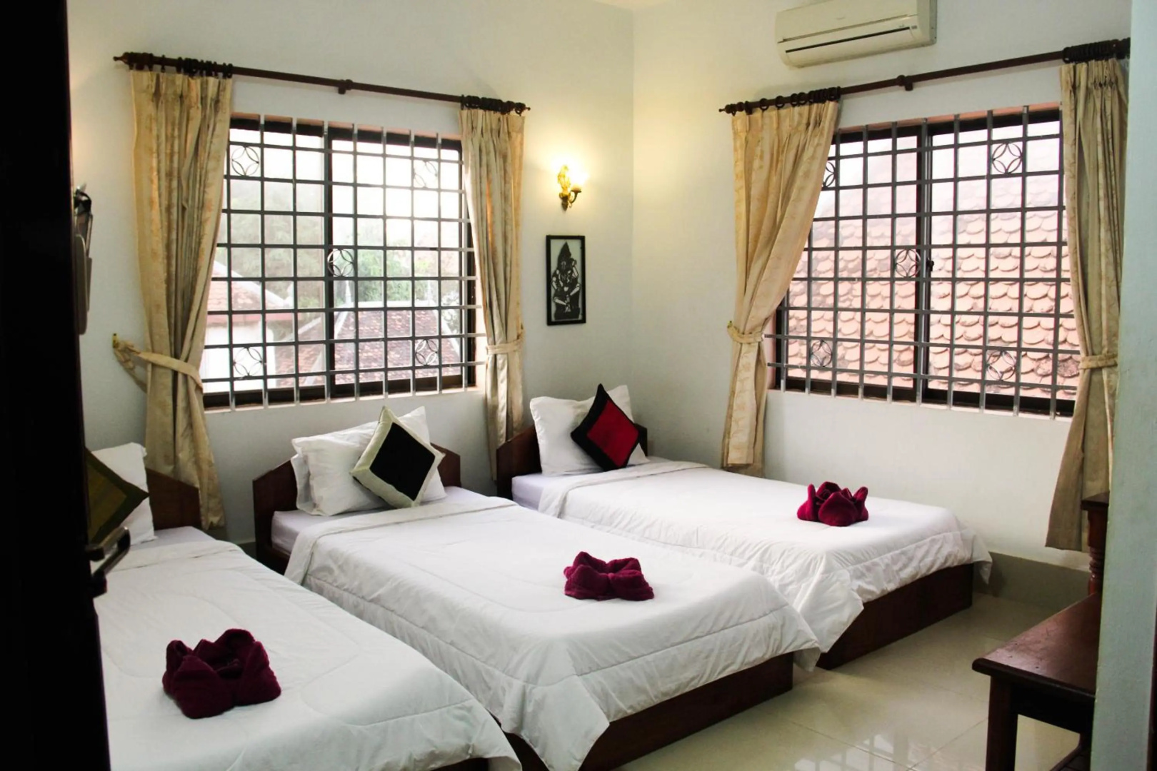 Foto - Tropical Breeze Guesthouse