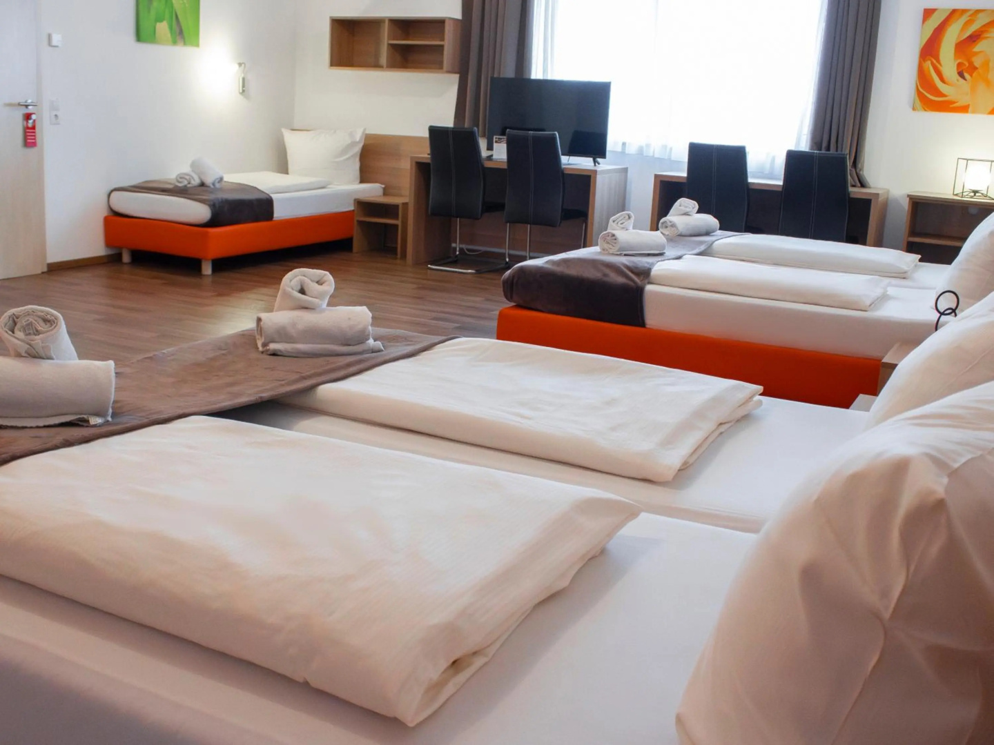 Foto - Orange Hotel und Apartments