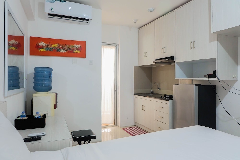 Tidy Studio Apartment at Bassura City near Shopping Mall