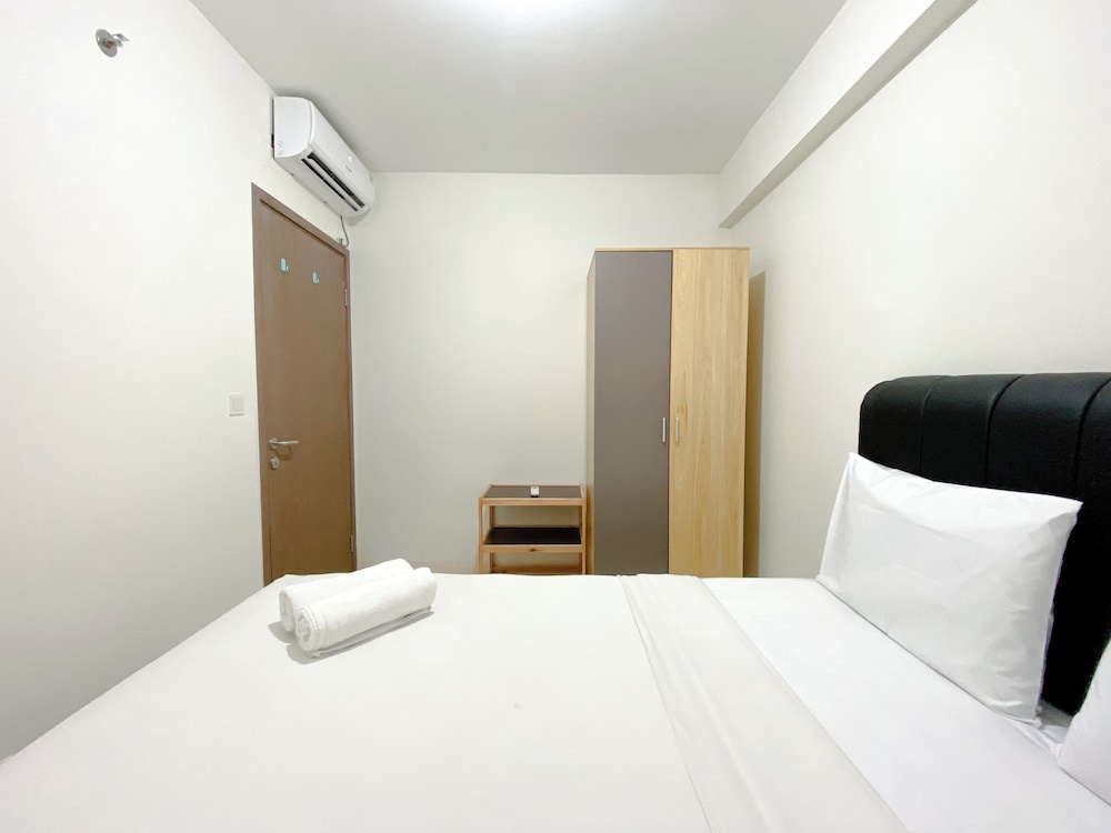 Tidy and Warm 2BR at Podomoro Golf View Apartment