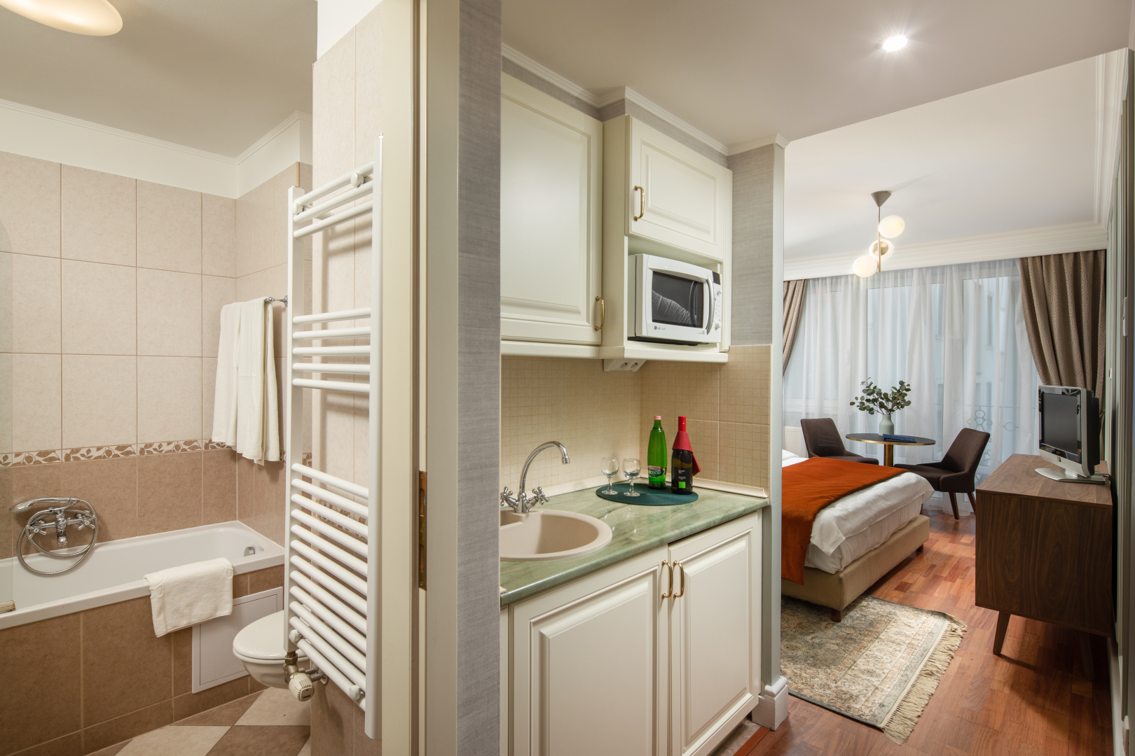 Foto - Queen's Court Hotel & Residence