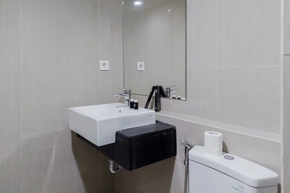 Minimalist and Serene 1BR at Bintaro Embarcadero Apartment
