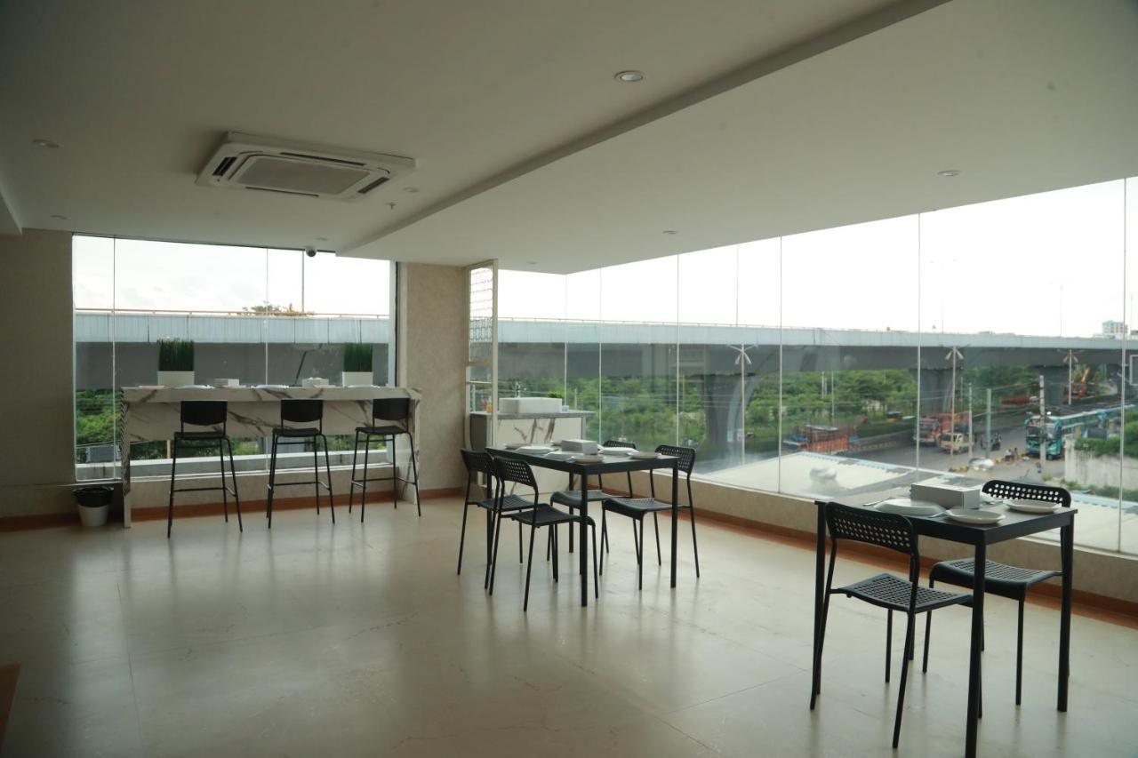Foto - Grand Manor Suites