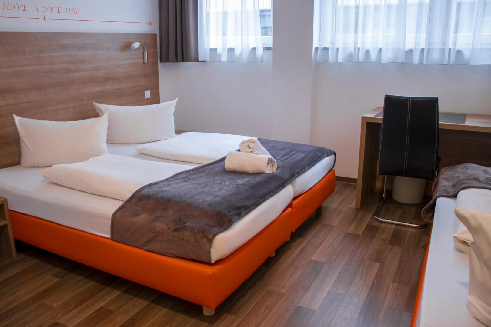 Foto - Orange Hotel und Apartments