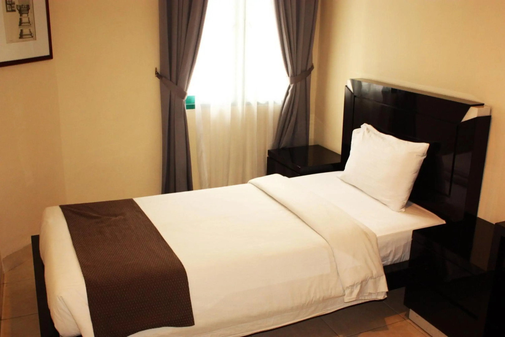 Foto - Travellers Suites Serviced Apartments