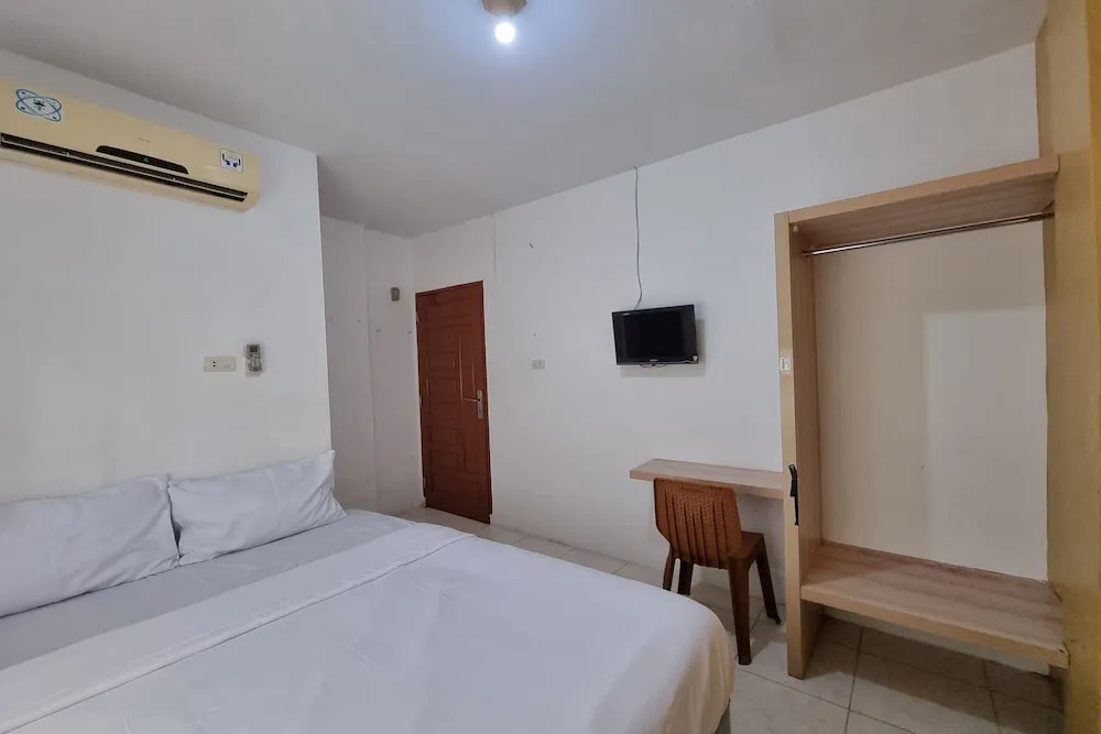 Foto - Hotel O Wira Residensia Syariah