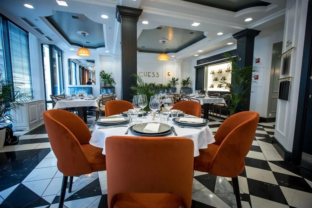 Foto - Queen's Court Hotel & Residence