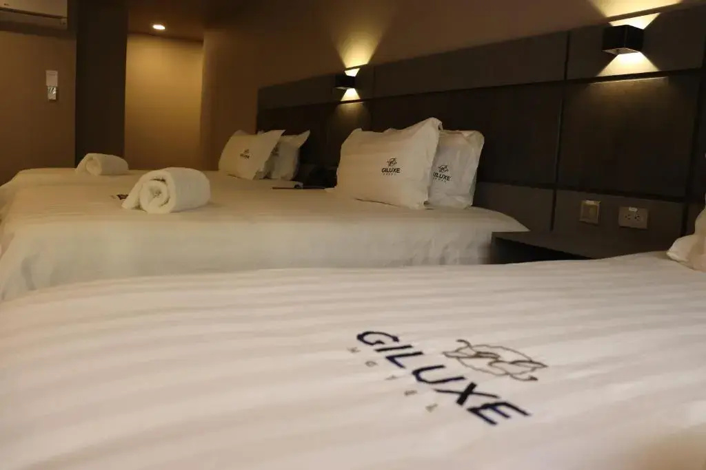 Foto - Giluxe Hotel