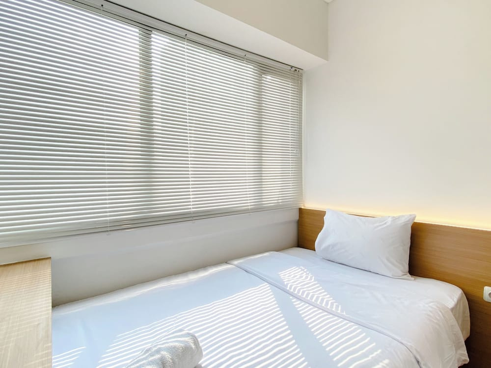 Spacious And Homey 2Br With Work Space At Meikarta Apartment