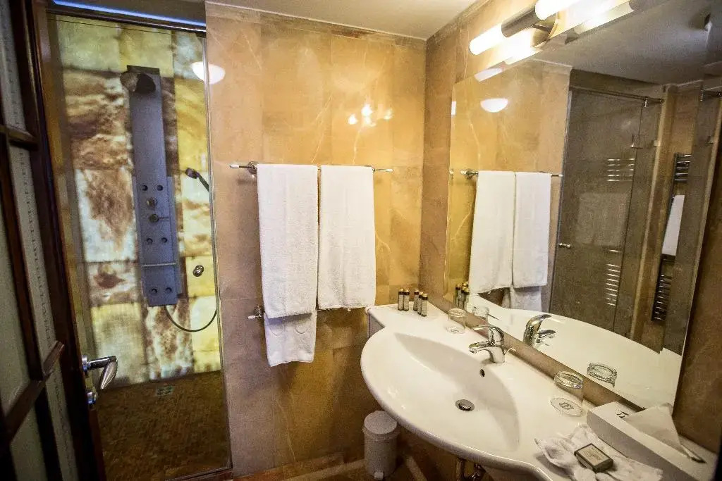 Foto - Queen's Court Hotel & Residence