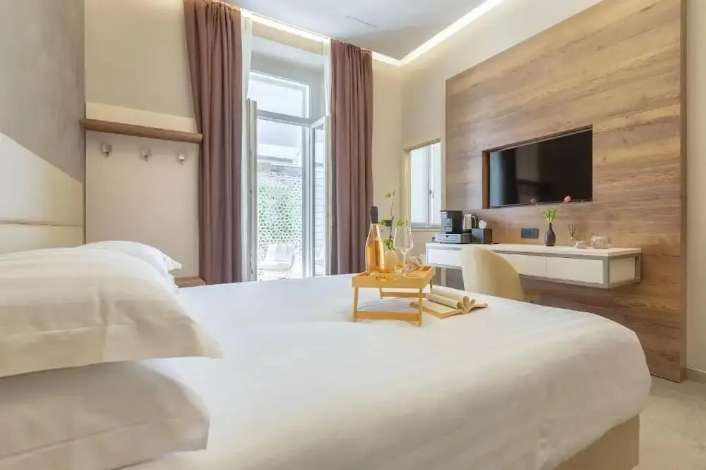 Foto - Mesbeglia Luxury Rooms