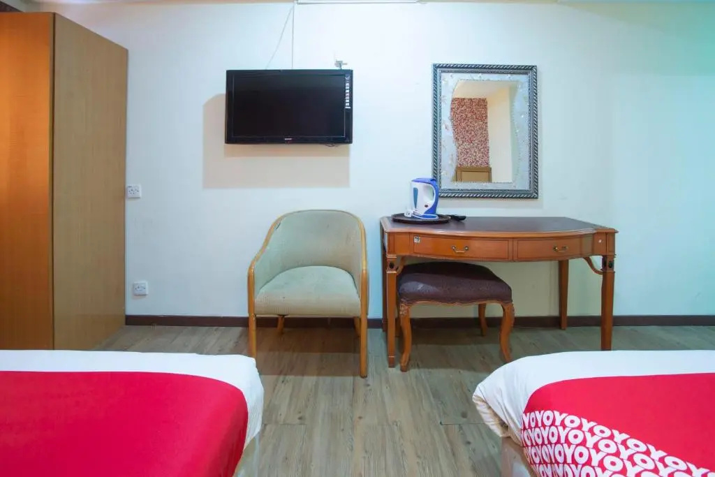 Photo - Capital O Hotel Grand Orchard