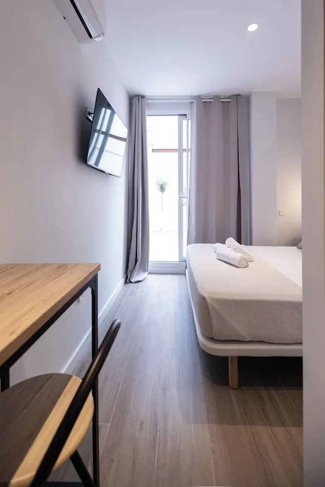 Photo - Yard Patraix by Concept Flats