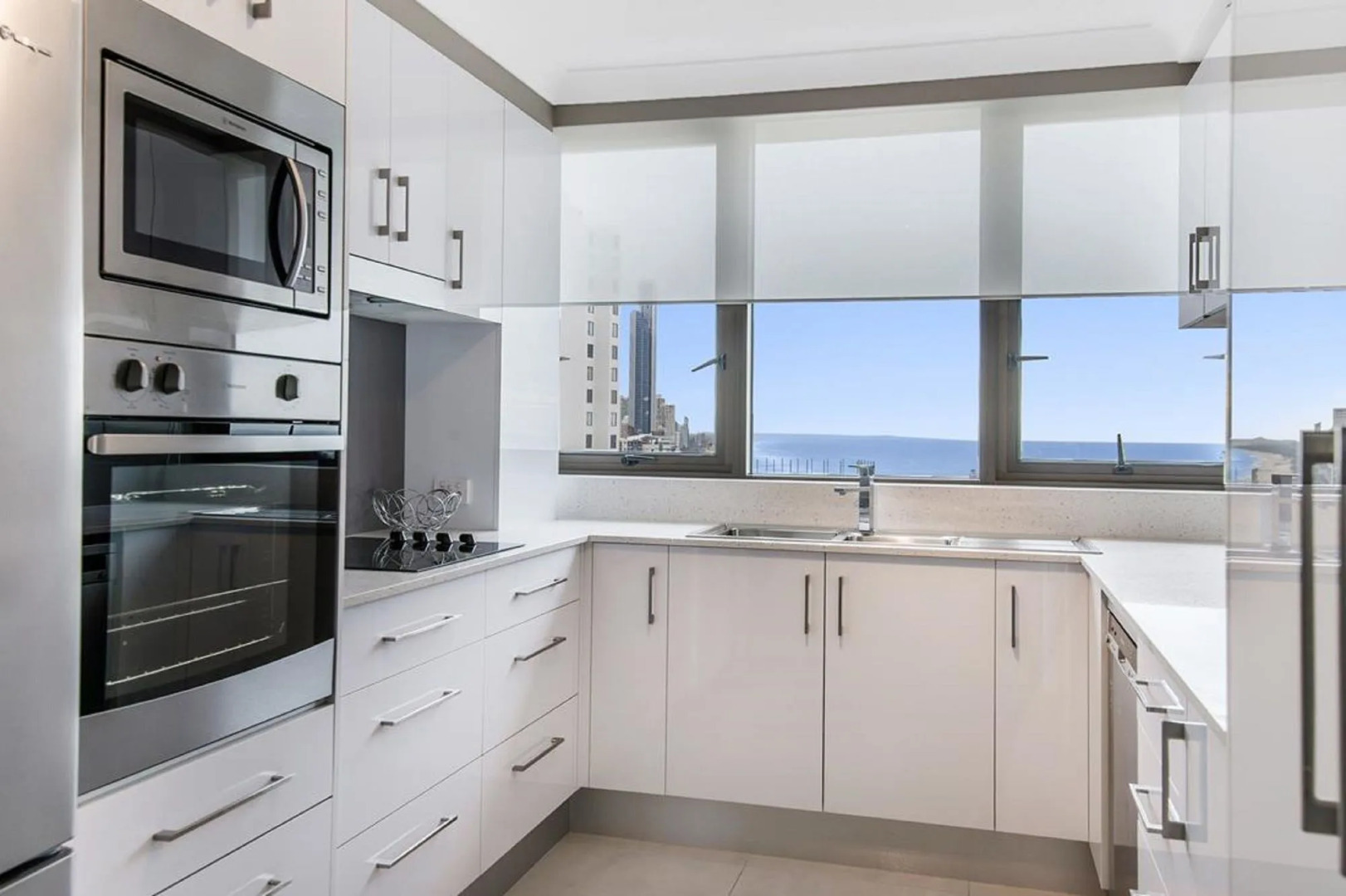 Photo - Surfers Aquarius on the Beach