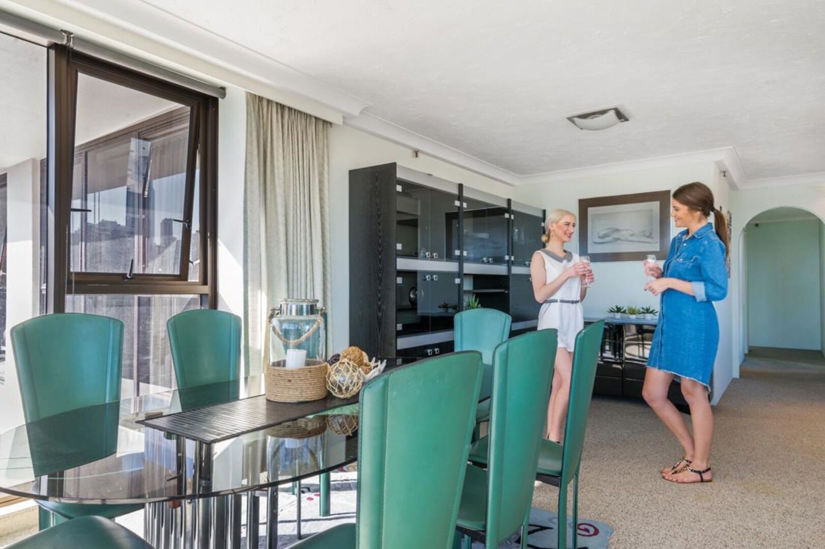 Photo - Surfers Aquarius on the Beach