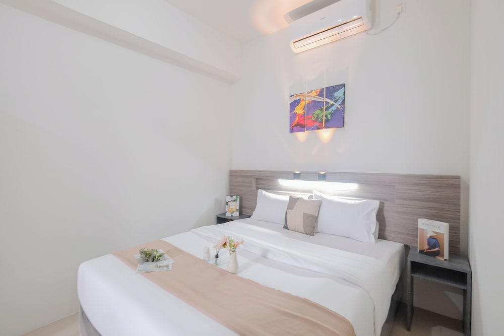 Warm and Spacious 2BR Apartment at Vittoria Residence