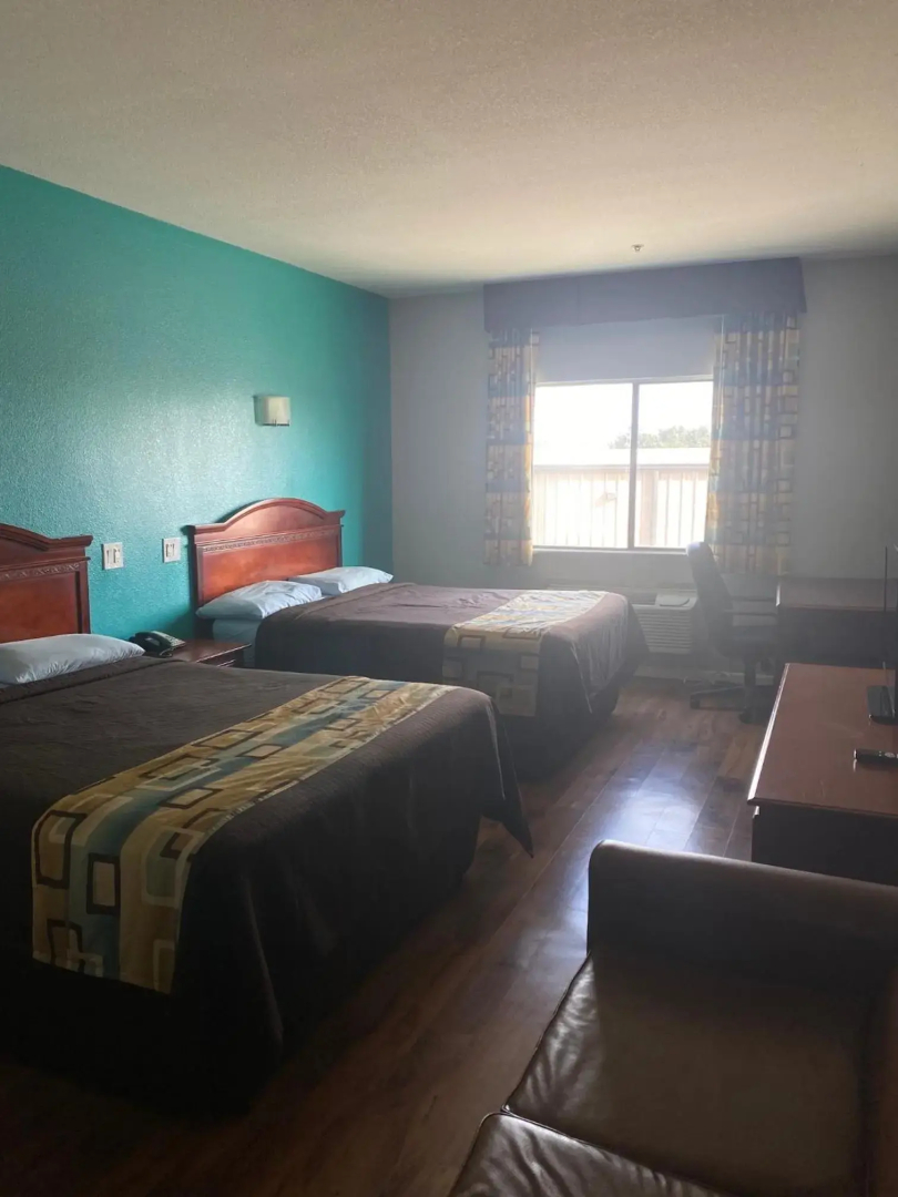 Foto - Tropicana Inn and Suites