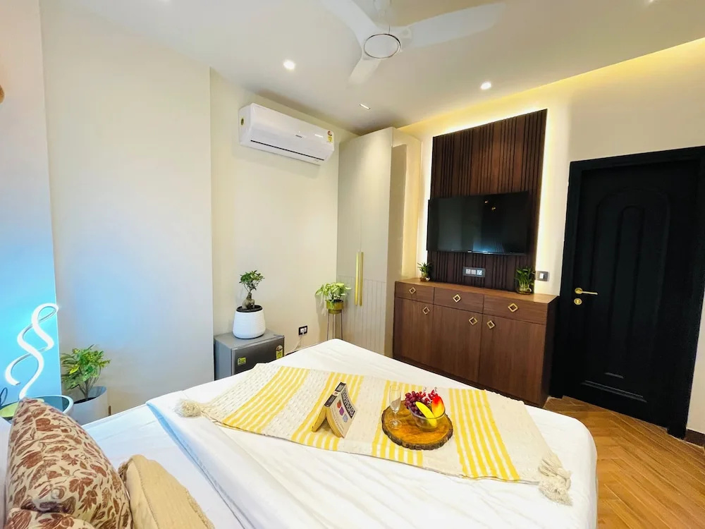 Foto - Bedchambers Stay near Select Citywalk, Saket