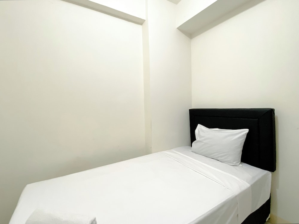 Tidy and Warm 2BR at Podomoro Golf View Apartment