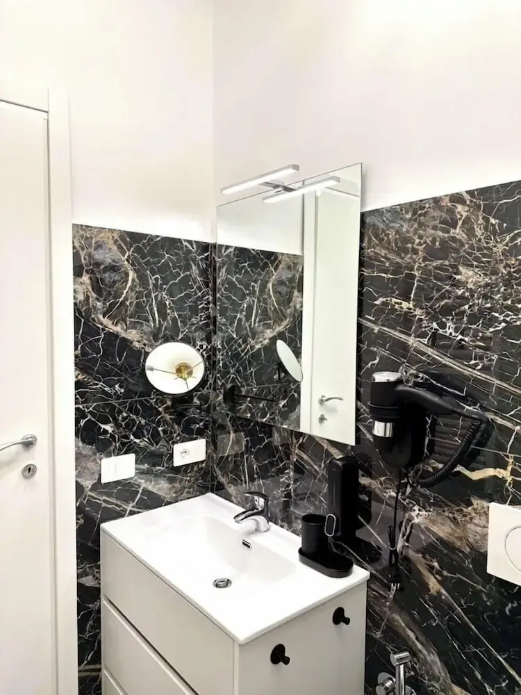 Photo - Vacanze Romane Suite 7 Languages