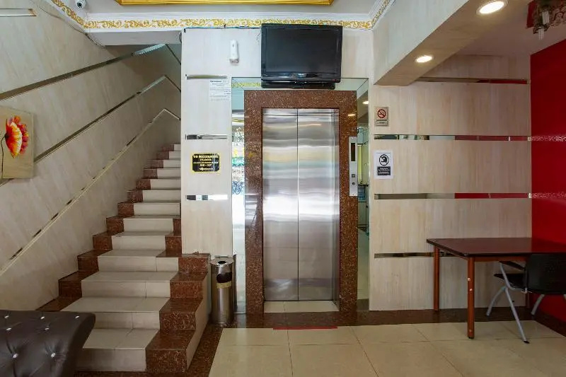 Photo - Capital O Hotel Grand Orchard
