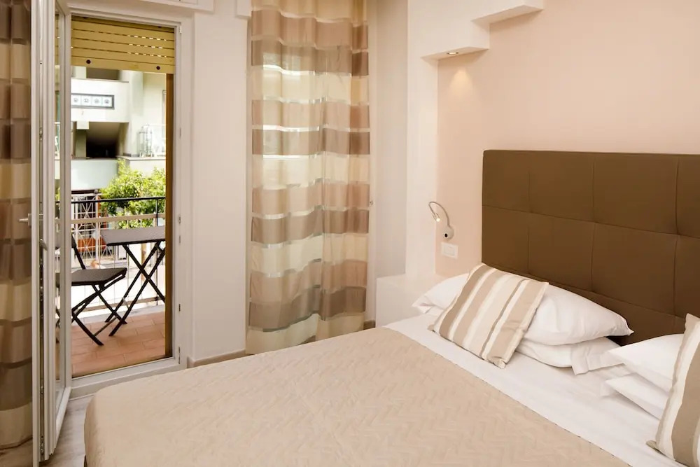 Photo - Sorrento Comfort Rooms con piscina