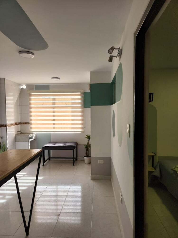 Photo - Conexión apartamentos y habitaciones