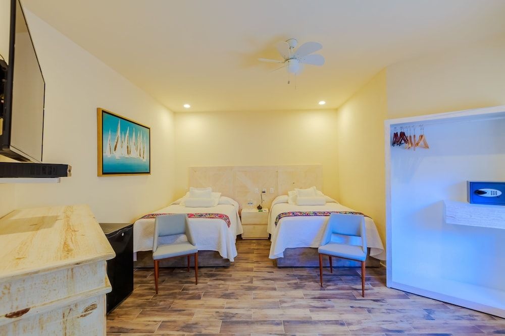 Foto - Hotel Paradise Suites