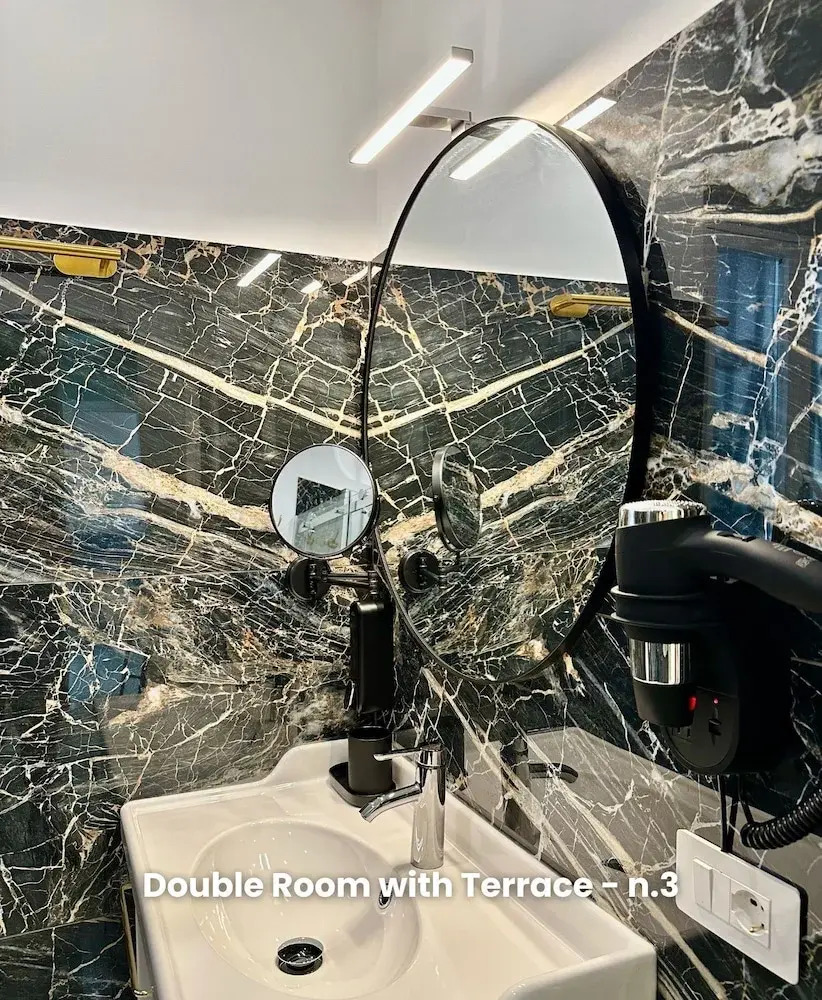 Photo - Vacanze Romane Suite 7 Languages