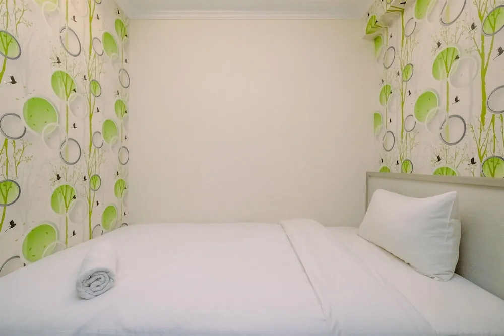 Warm and Comfortable Designed 2BR at Podomoro Golf View Apartment
