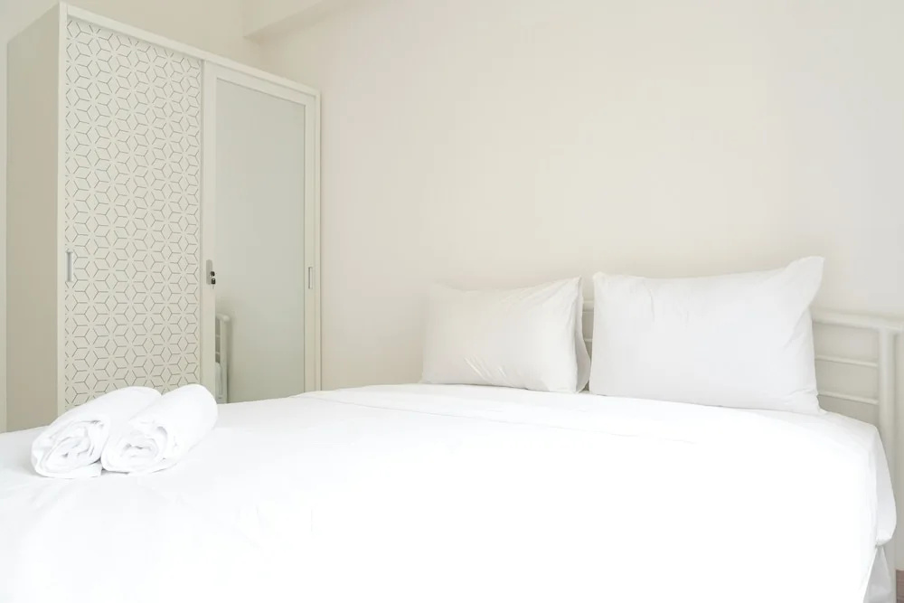 Minimalist and Restful 2BR at Podomoro Golf View Apartment