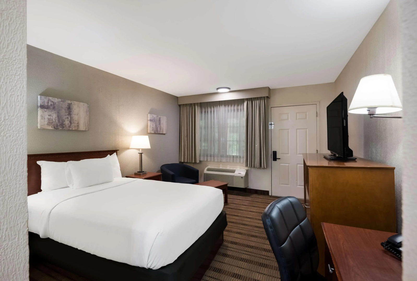 Photo - SureStay Plus by Best Western Woodbury Inn