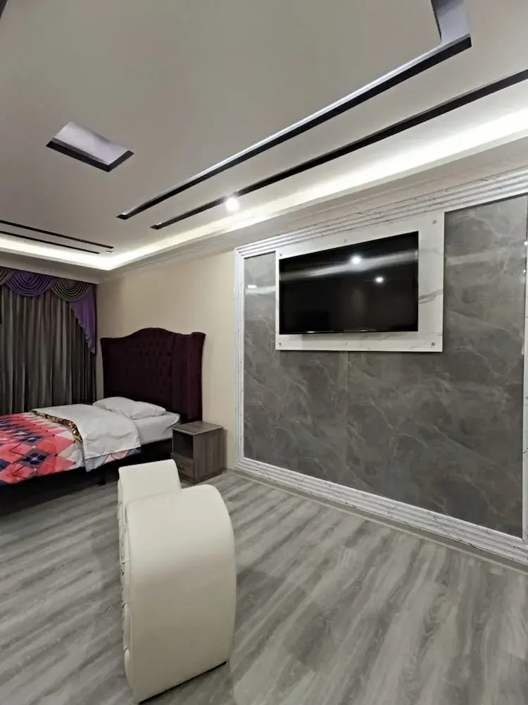 Foto - Hostal Kapital City