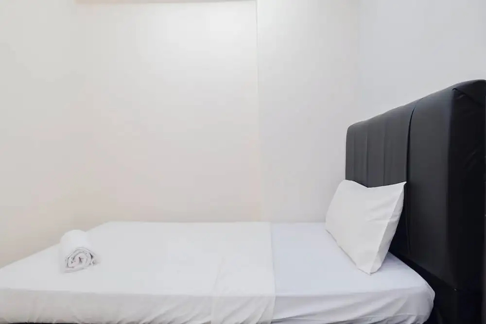 Comfort and Homey 2BR at Podomoro Golf View Apartment