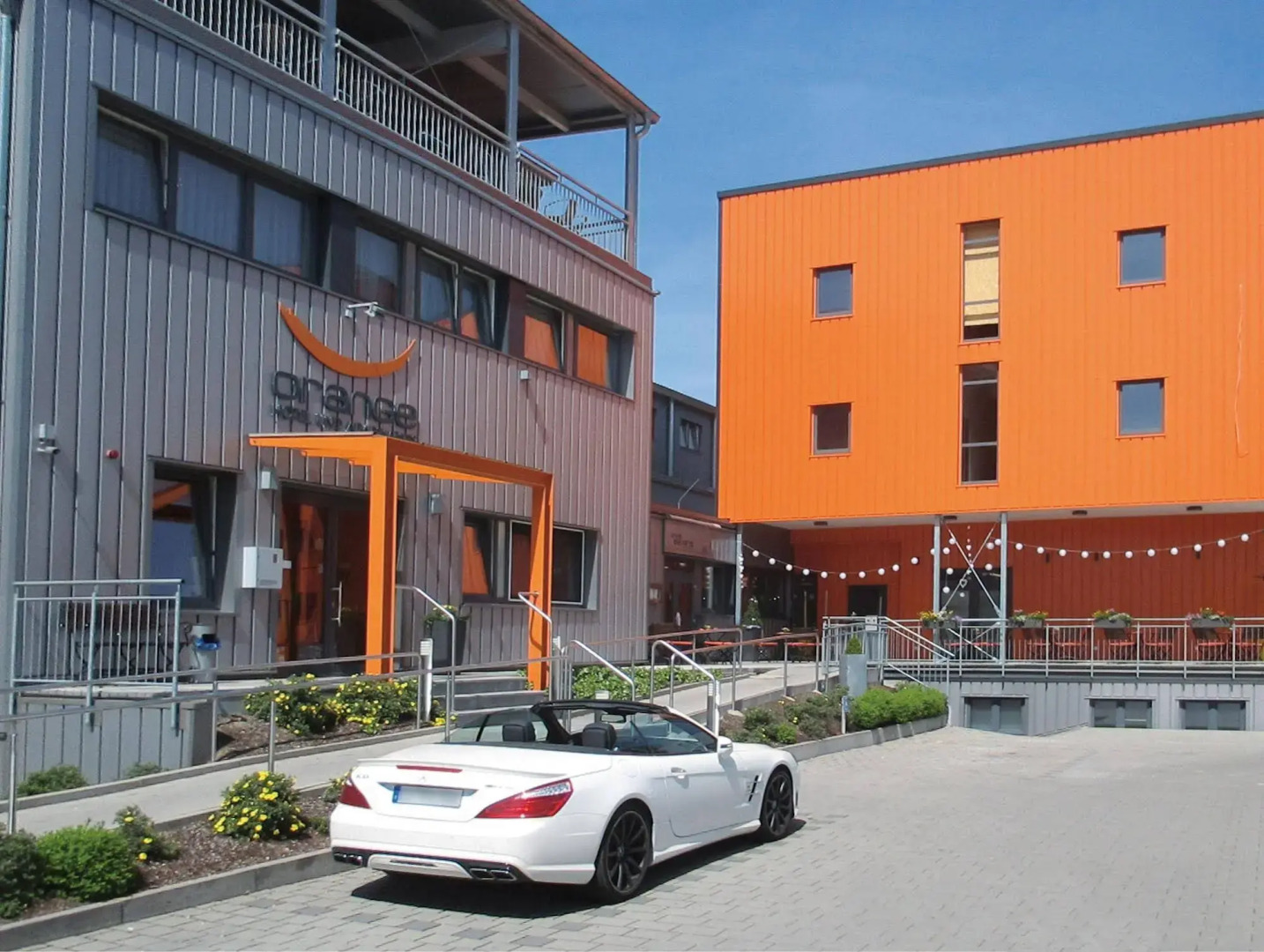 Foto - Orange Hotel und Apartments
